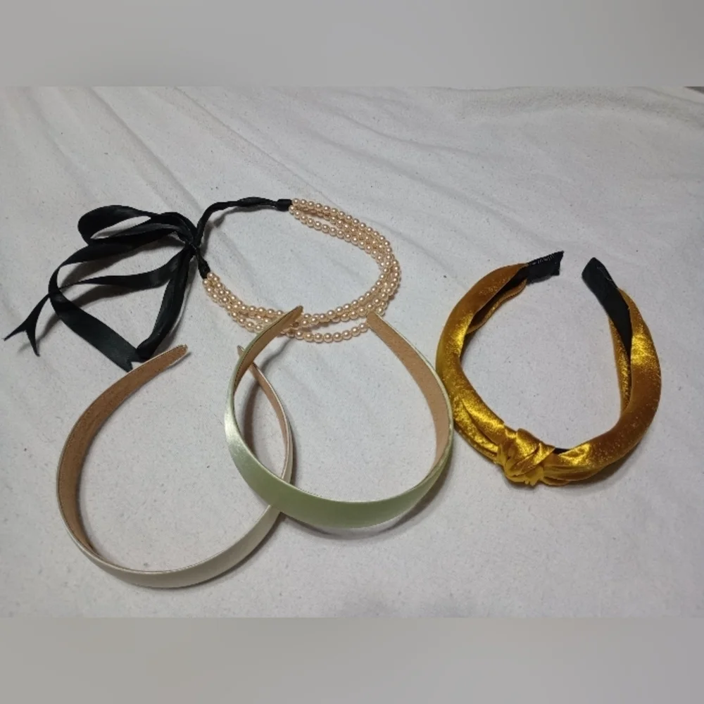 4 headbands, one Pearl and one gold knot